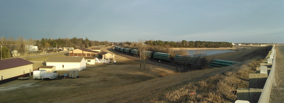 About a dozen rail cars at Mina hold pipeline for the Dakota Access project, bound for stockpile six miles west of Aberdeen.