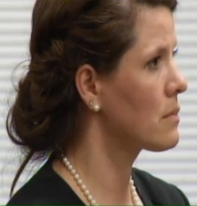 Annette Bosworth hears the jury say "Guilty" 12 times. Hughes County Courthouse, Pierre, SD, May 27, 2015. (screen cap from KELOLand.com)