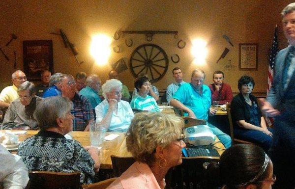 How many members of this all-white, mostly Christian audience believe the End Times are coming and thus, by Ravnsborg's reasoning, are hard to reason with? Brown County GOP lunch, Aberdeen, South Dakota, 2015.07.09.