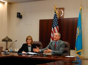 Governor Dennis Daugaard explains what comes next in the IHS/Medicaid expansion plan. To his right is Secretary of Health Kim Malsam-Rysdon. Capitol press conference, Pierre, SD, 2016.02.29.