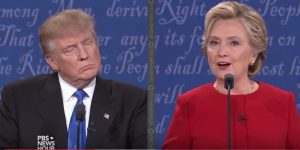Hillary Clinton explains policy, while Donald Trump waits to shoot himself again in the foot. Presidential Debate, 2016.09.26. Screen cap from PBS NewsHour.