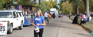 District 3 House candidate Nikki Bootz works another candy bucket.