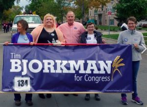 Tim Bjorkman and some supporters in NSU homecoming parade, two blocks from my house! Photo by Dennis Olson, Beadle/Kingsbury Democrats FB page, 2017.09.30.