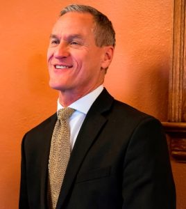 That gold tie must symbolism a surrender to idea-less Trumpism; it sure doesn't represent any gold in Governor Daugaard's budget proposal. (Photo from Governor's Office, 2017.12.05.)