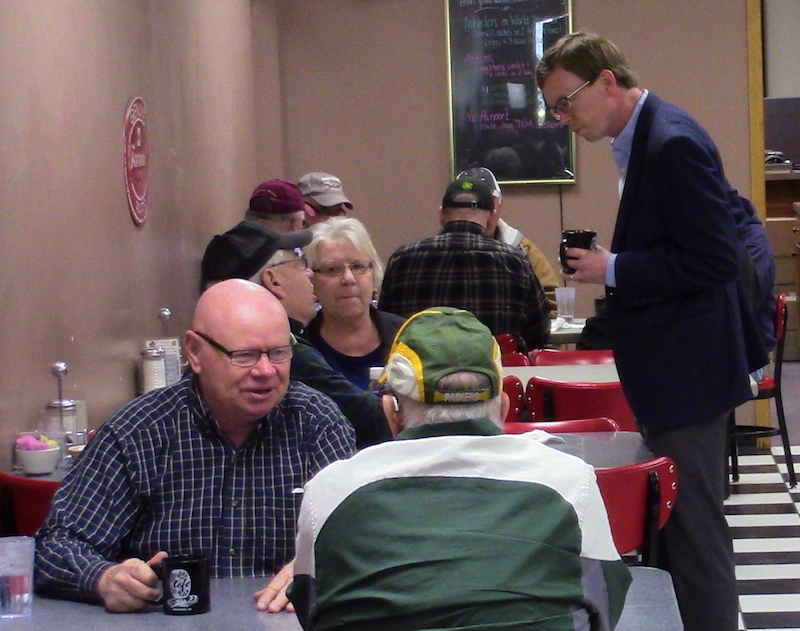 Dusty Johnson, GOP US House candidate, speaks to customers at the Airport Café, Aberdeen, SD, 2018.04.25.