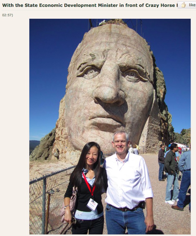 Chinese blogger/SD Dept. Tourism visitor/intern "shonnadu" with Secretary Richard Benda at Crazy Horse, July 2010.