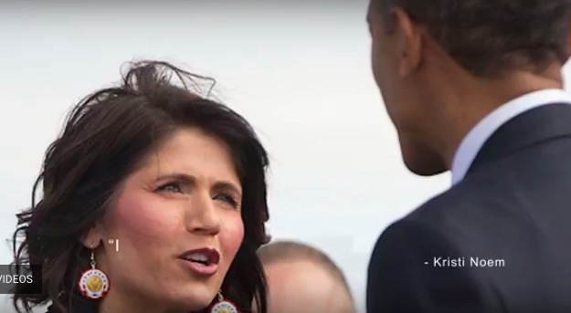 Rep. Kristi Noem greeting President Barack Obama in Watertown, May 8, 2015. Photo by Pablo Martinez Monsivais, AP; clipped and used in anti-Noem ad posted by Marty Jackley for Governor, 2018.05.31. 