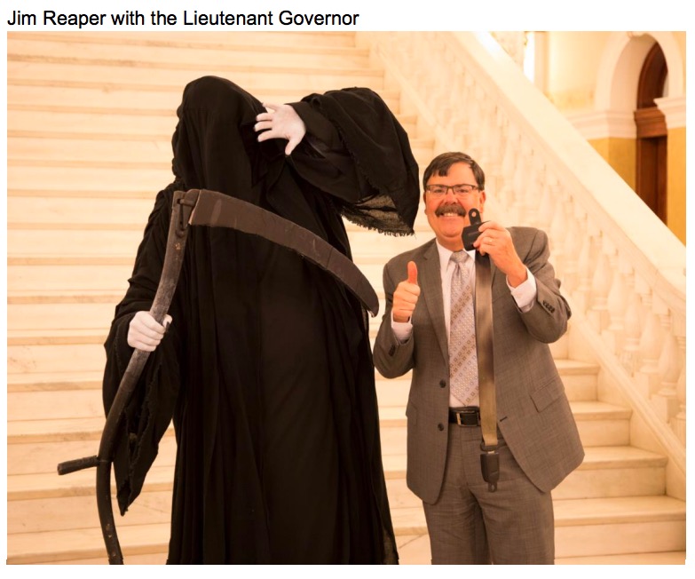 For real: DPS includes this photo of "Jim Reaper" and Lt. Gov. Matt Michels in its report to GOAC, July 2018.