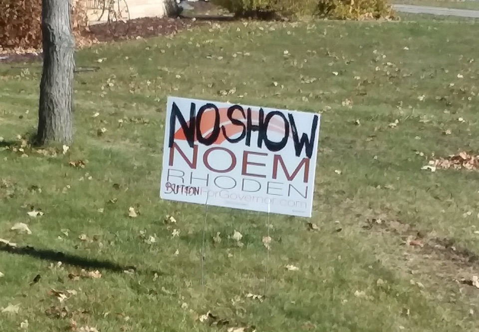 Noem/Rhoden sign repurposed, Watertown, South Dakota; photo received by DFP 2018.10.31.