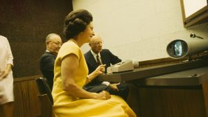 Yes, Mrs. Johnson, we can notarize that for you now... [Lady Bird Johnson with AT&T Picturephone, 1964].