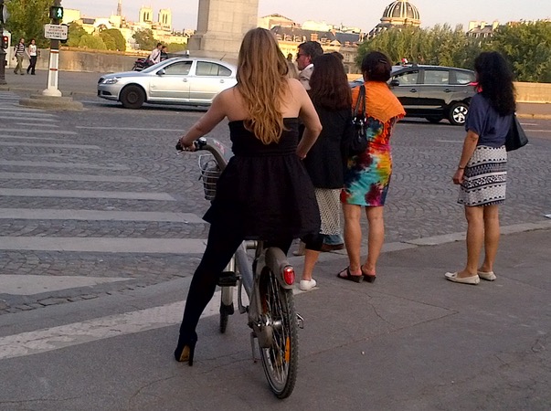 Woman on bicycle in Paris