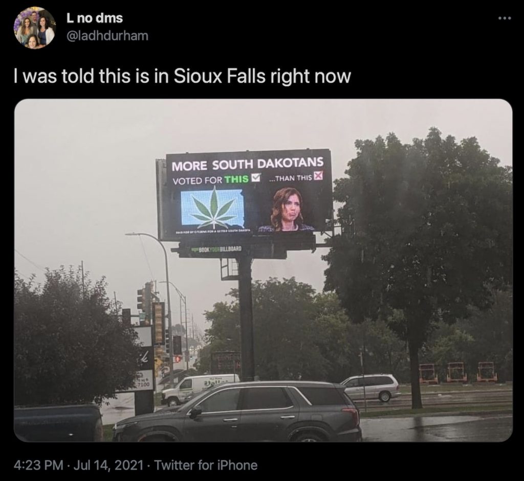 What's more popular, marijuana or Kristi Noem? Billboard at 14th and Cliff, Sioux Falls, SD; from Twitter pic, 2021.07.14.