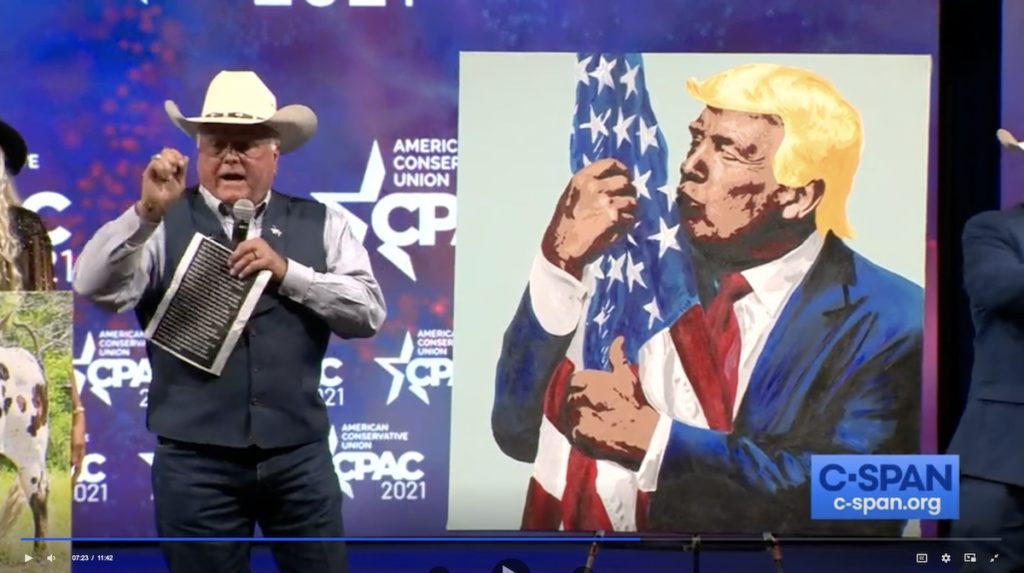C-SPAN, screen cap from video of CPAC auction, Dallas, Texas, 2021.07.11.