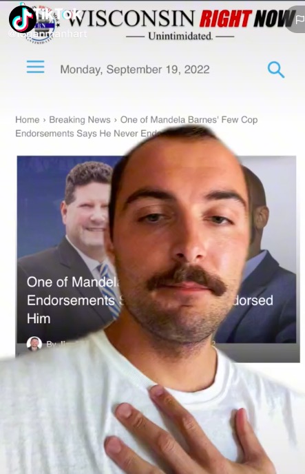  Logan Manhart and I have one thing in common: we both rock the 'stache! Logan Manhart, Tiktokking about Wisconsin, 2022.09.19, screen cap 2022.12.23.