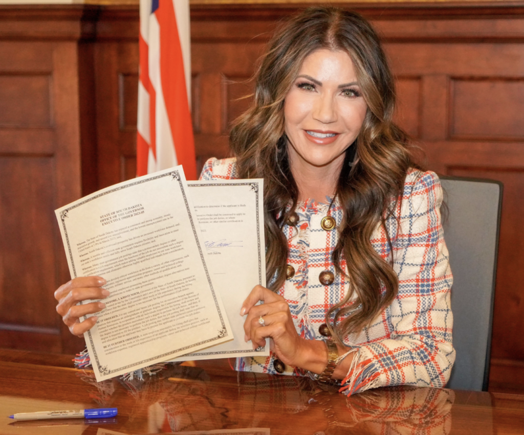 Gov. Kristi Noem displays Executive Order 2023-05, 2023.04.24. Photo from Governor's Office.
