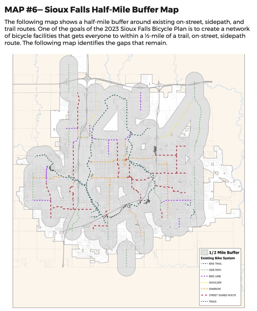 Half-mile buffer map, showing half-mile radius from bike trails (grey) and areas in the city farther than a half-mile from trails (white), from draft 2023 Bicycle Plan, City of Sioux Falls, retrieved 2023.05.18.