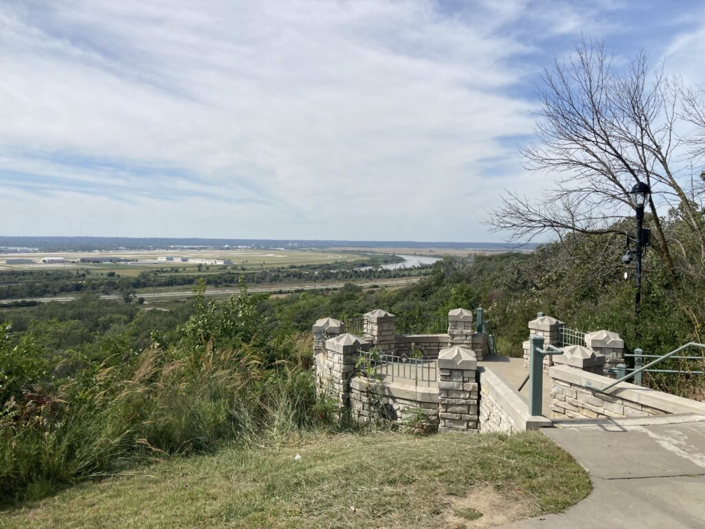 But hills mean vistas, and I found this vista at the top of Monument Road, where the Lewis and Clark monument looks over the Missouri River, Eppley Airfield, downtown Omaha, and Council Bluffs.